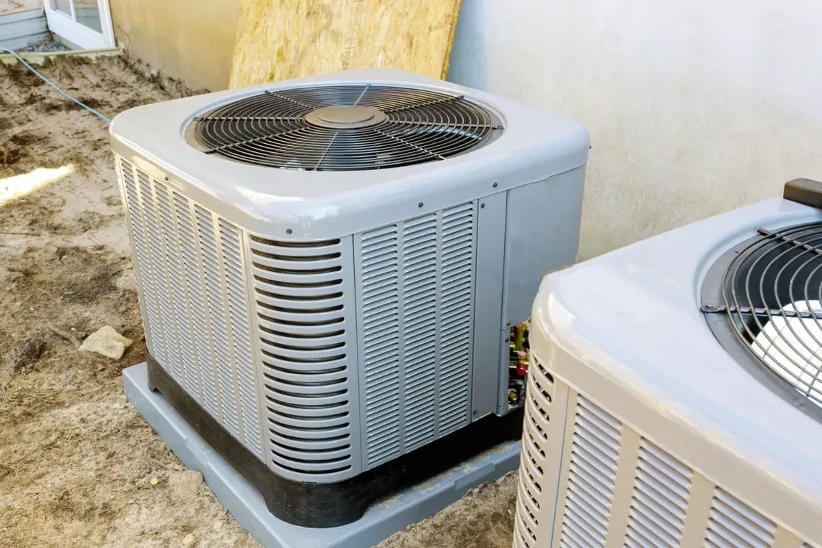 Two outdoor air conditioner condensers